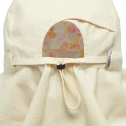 Sunday Afternoons Natural Blend Cape 33 Sunday Afternoons Natural Blend Cape -hat natural blend cape magnolia pink petals rear sizing detail ss24 2500px